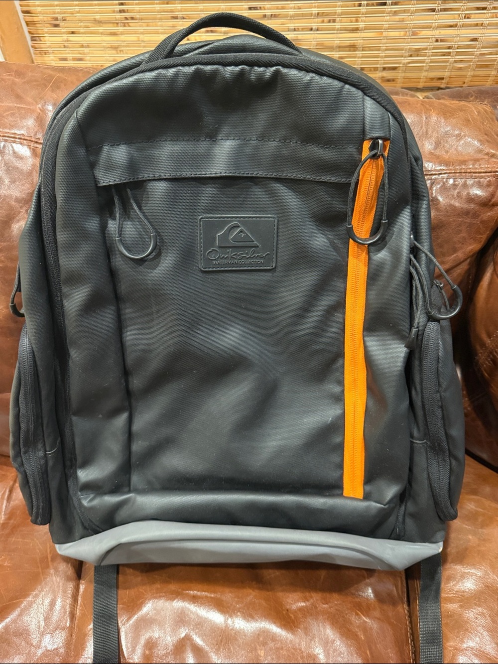 Quiksilver Black Backpack with Orange Zip Accent